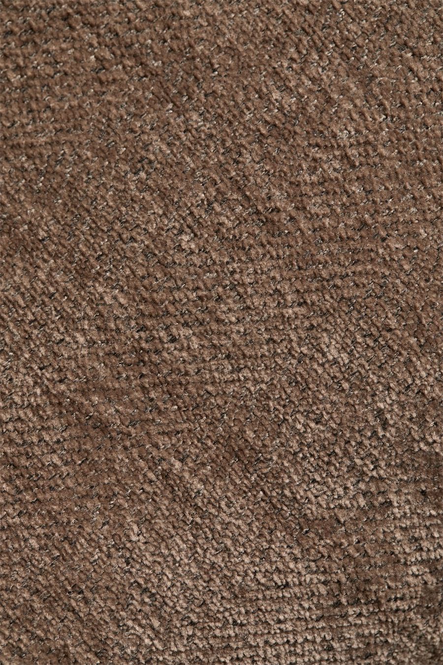 Gros plan sur la texture de la chenille brune du canapé Merida.