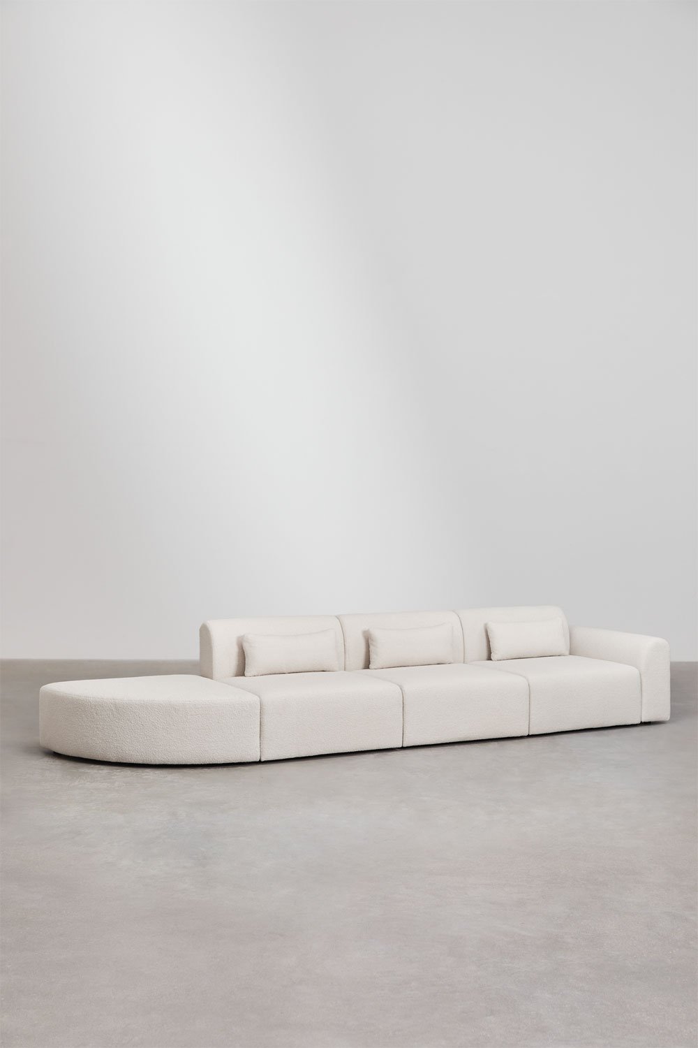 3-teiliges modulares Sofa in der rechten Ecke mit dreieckigem Sitzpuff aus Borjan-Lammfell, Galeriebild 2