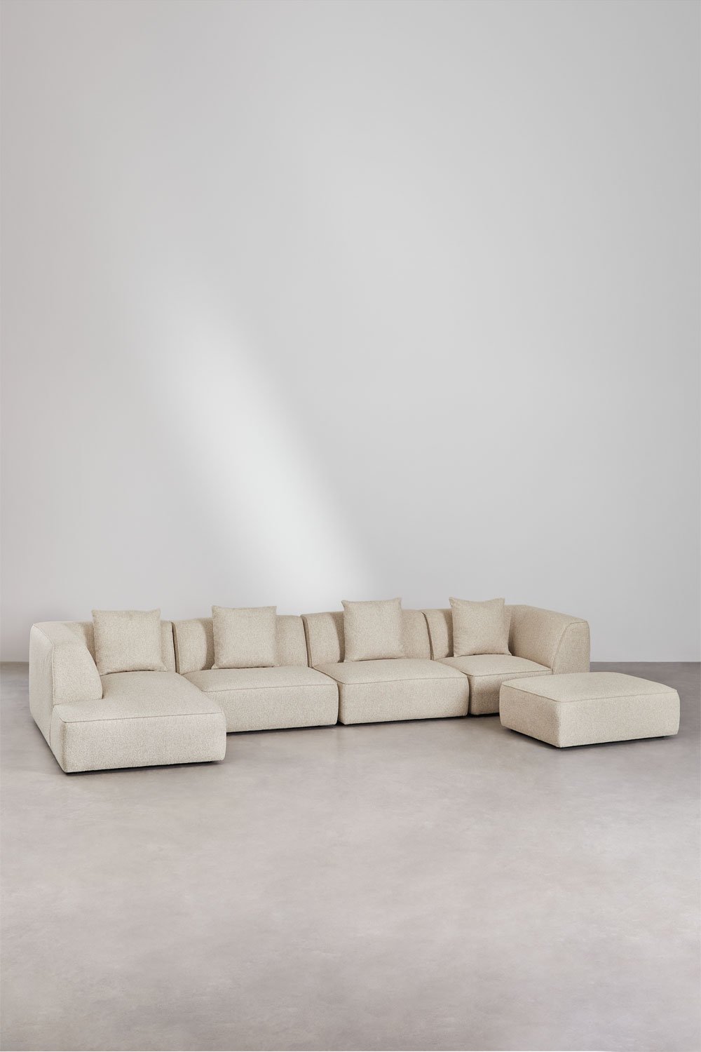 Modulares 4-teiliges Chaiselongue-Sofa links mit Pouf aus Cardea-Bouclé-Stoff, Galeriebild 1