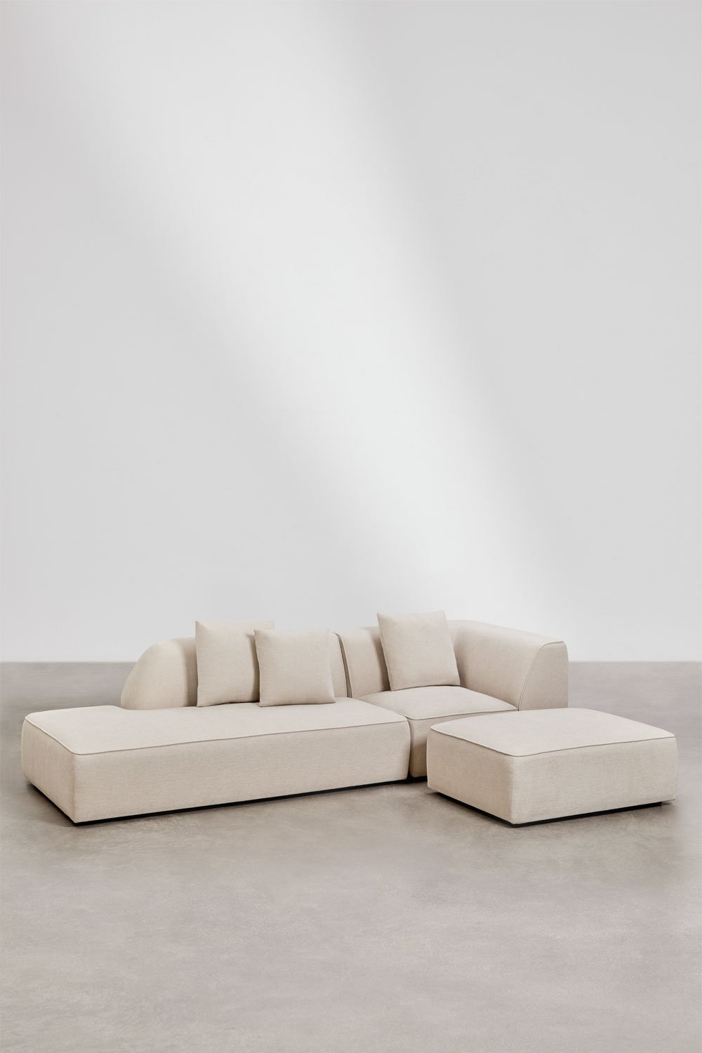 Cardea 2-teiliges modulares Ecksofa mit Chaiselongue links und gepolstertem Hocker, Galeriebild 1