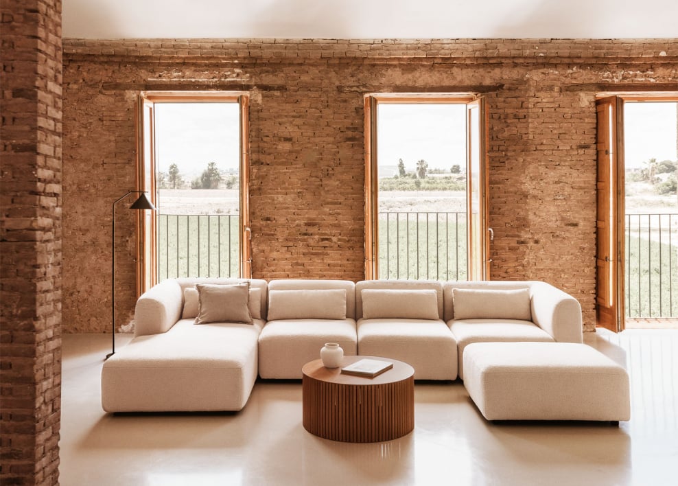 Sofá modular chaise longue izquierdo de 4 piezas con puff Fogler