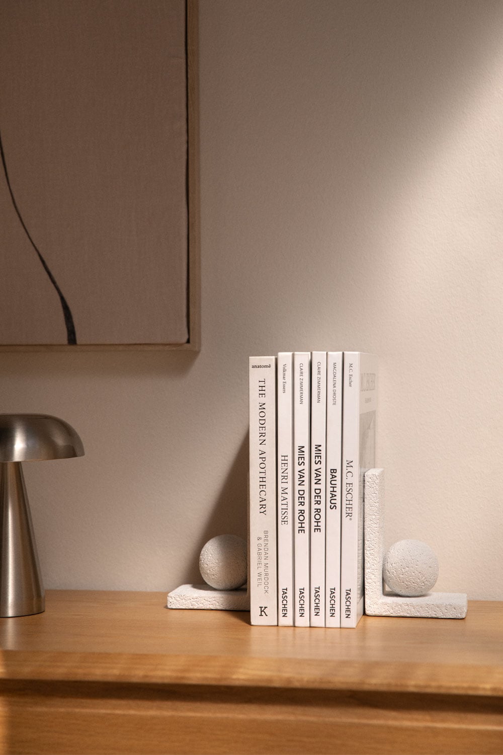 Sujetalibros de piedra con bola decorativa