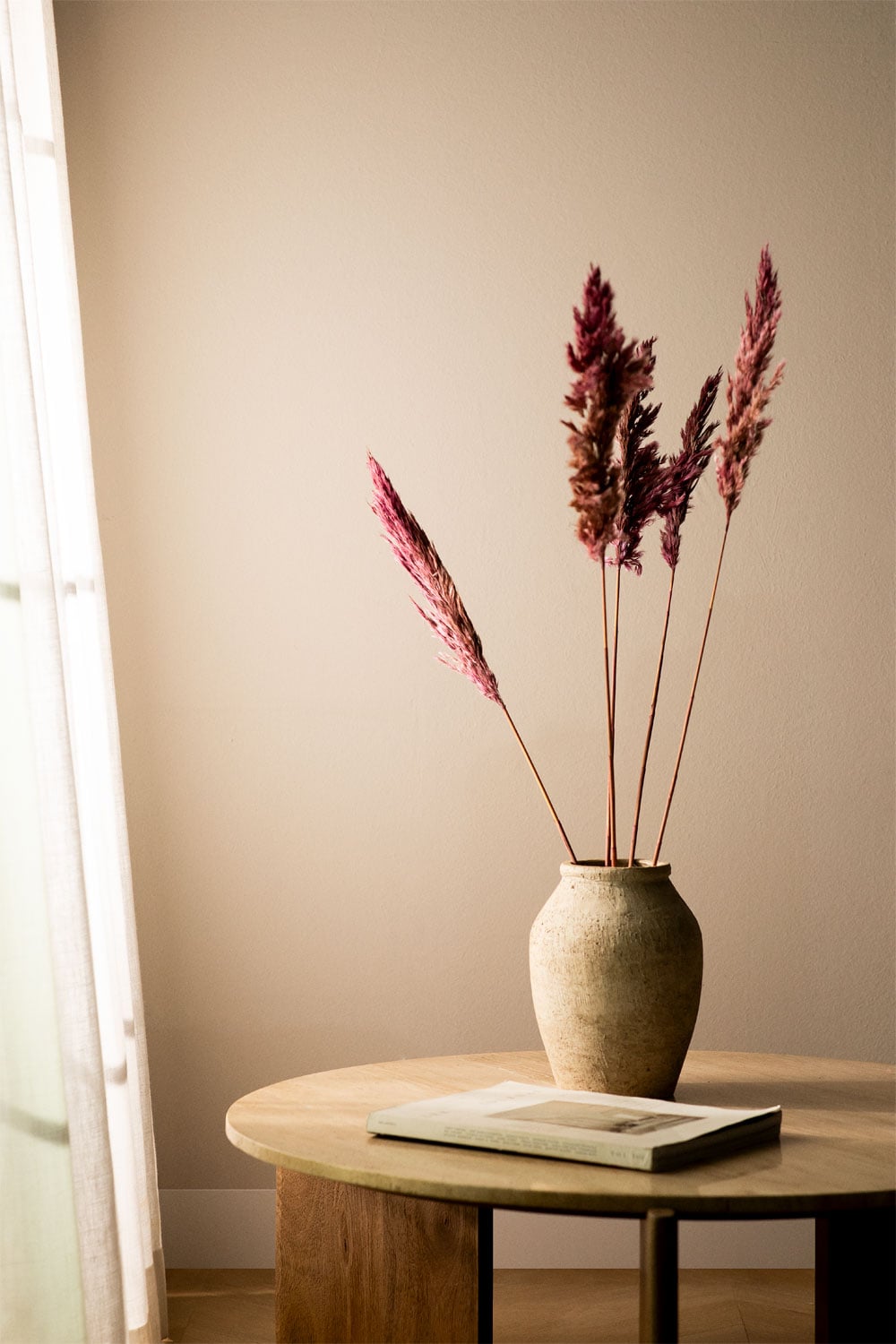 Mesa de centro redonda de madera clara