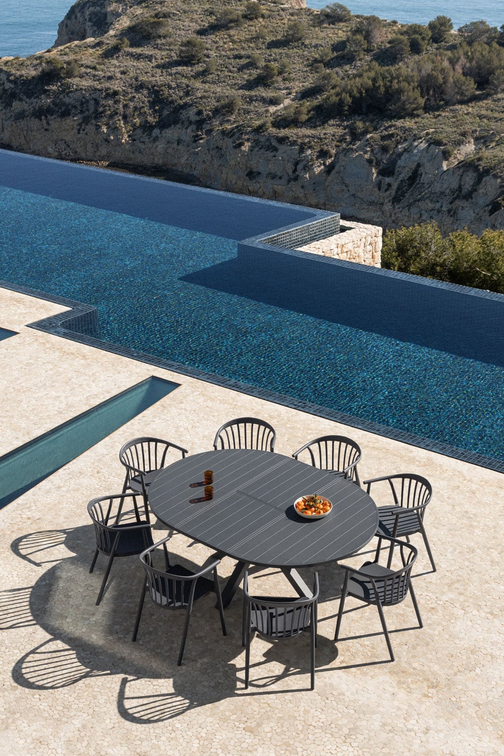 Set de mesa de jardín extensible de aluminio y 8 sillas con reposabrazos