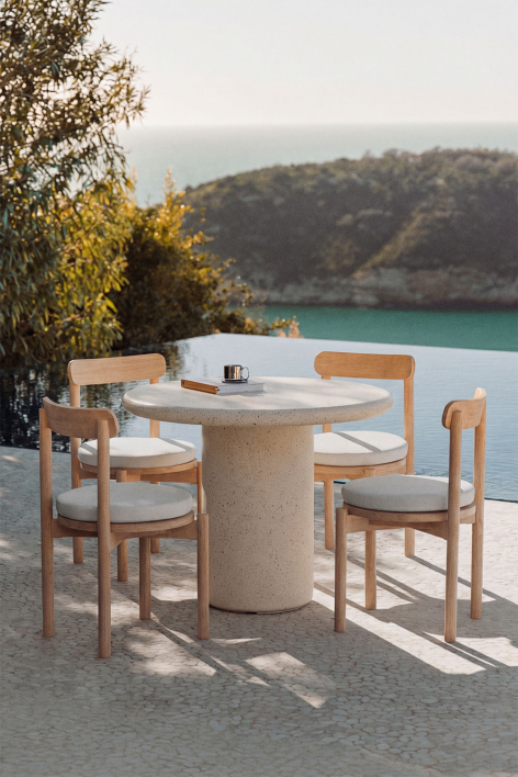 Mesa de jardín redonda en cemento Emiria