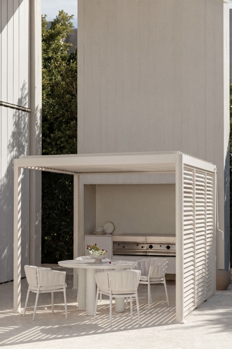 Pergola bioclimatique en aluminium avec lames et panneau latéral Druvia