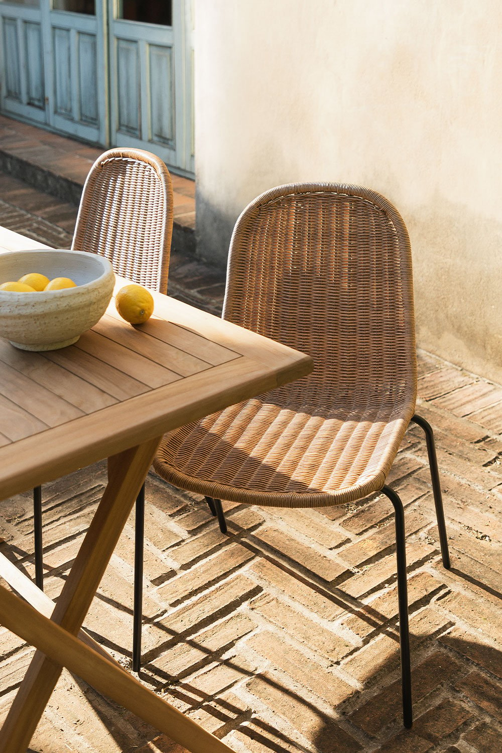 Stackable wicker store dining chairs