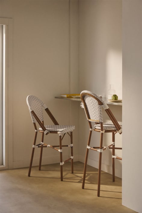 Stackable high stool with aluminum backrest and synthetic rattan Brielle Bistro