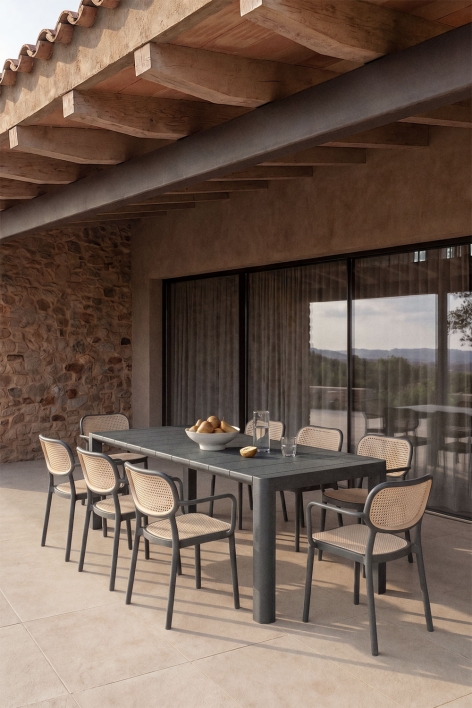 Rectangular table set 220x100 cm Arnadine and 8 stackable garden chairs with armrests in Omara polypropylene