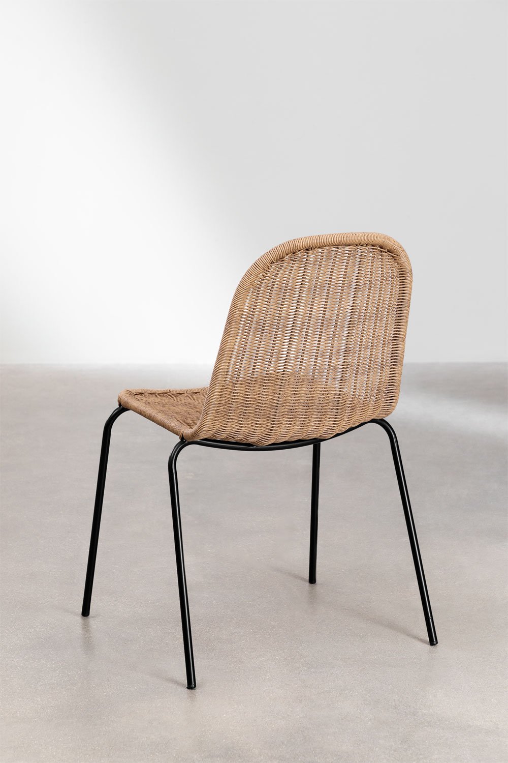 Stackable wicker store dining chairs