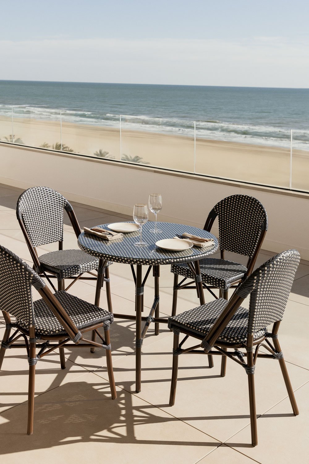 Brielle Bistro round table set Ø80 cm and 4 stackable garden chairs in aluminium and synthetic rattan, gallery image 1