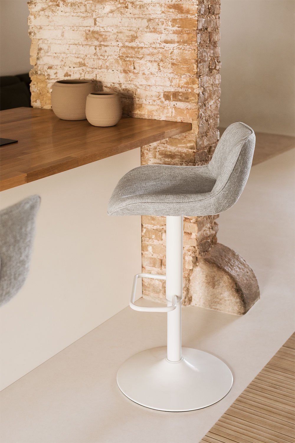 Adjustable high stool with metal backrest and Igarasi fabric, gallery image 1