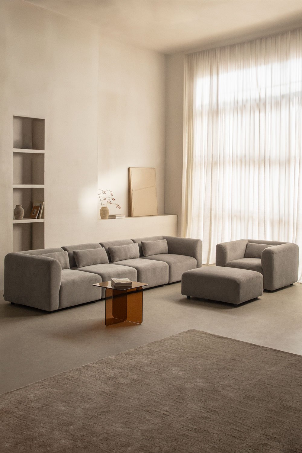 Living room set with 4-piece modular sofa, armchair and Fogler pouf, gallery image 1