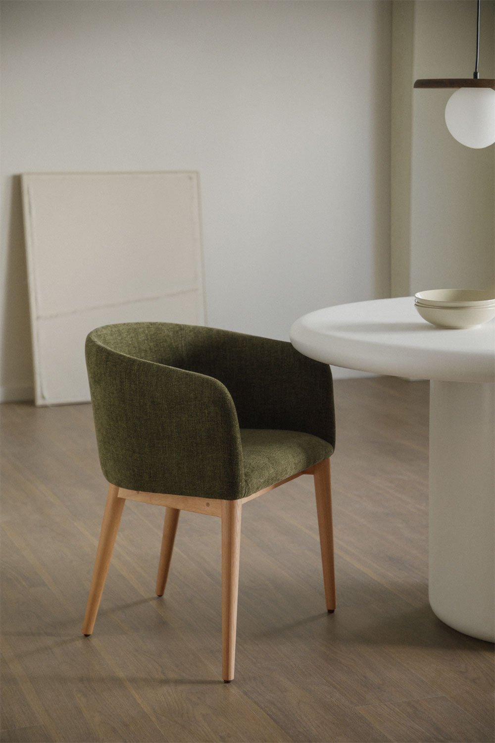 Bunia upholstered dining chair with armrests, gallery image 1