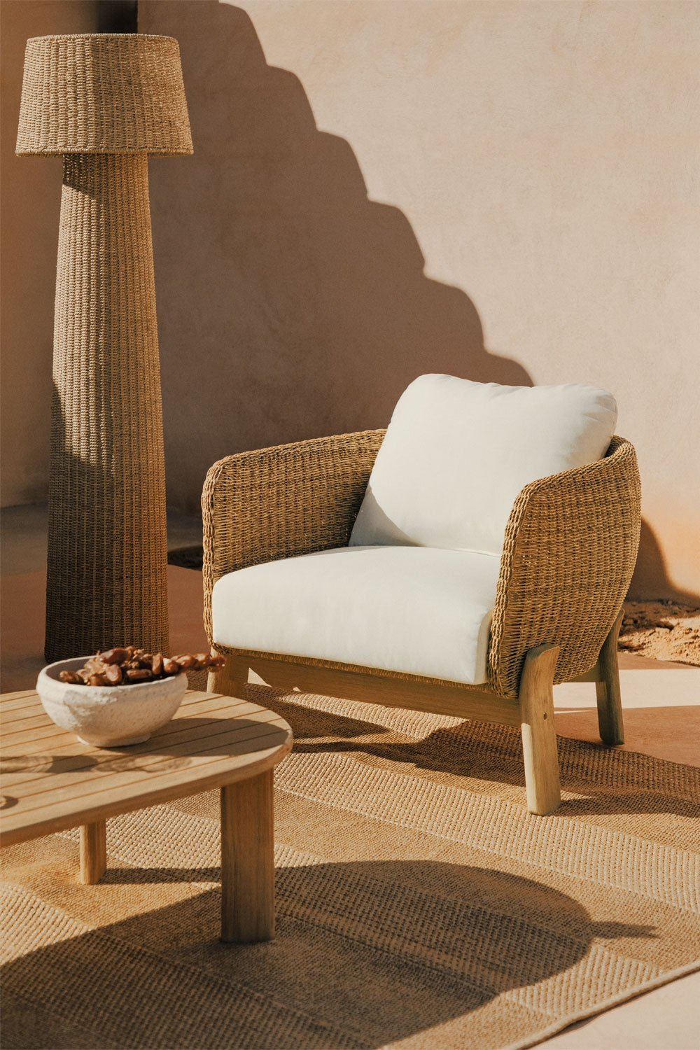 Leilan acacia wood and synthetic rattan garden armchair, gallery image 1