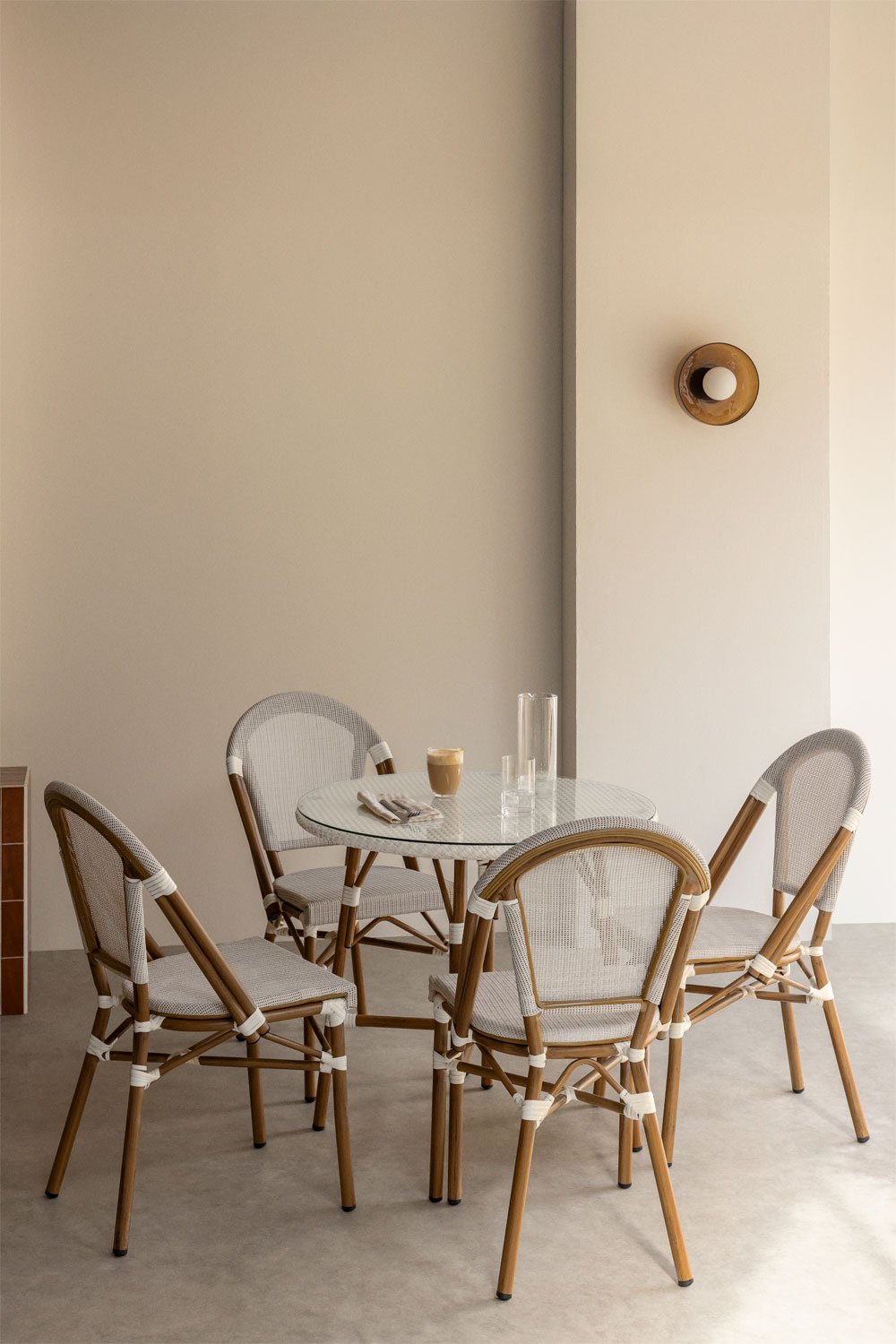 Set of round table Ø80 cm and 4 stackable chairs in textilene and aluminium Brielle Bistro, gallery image 1