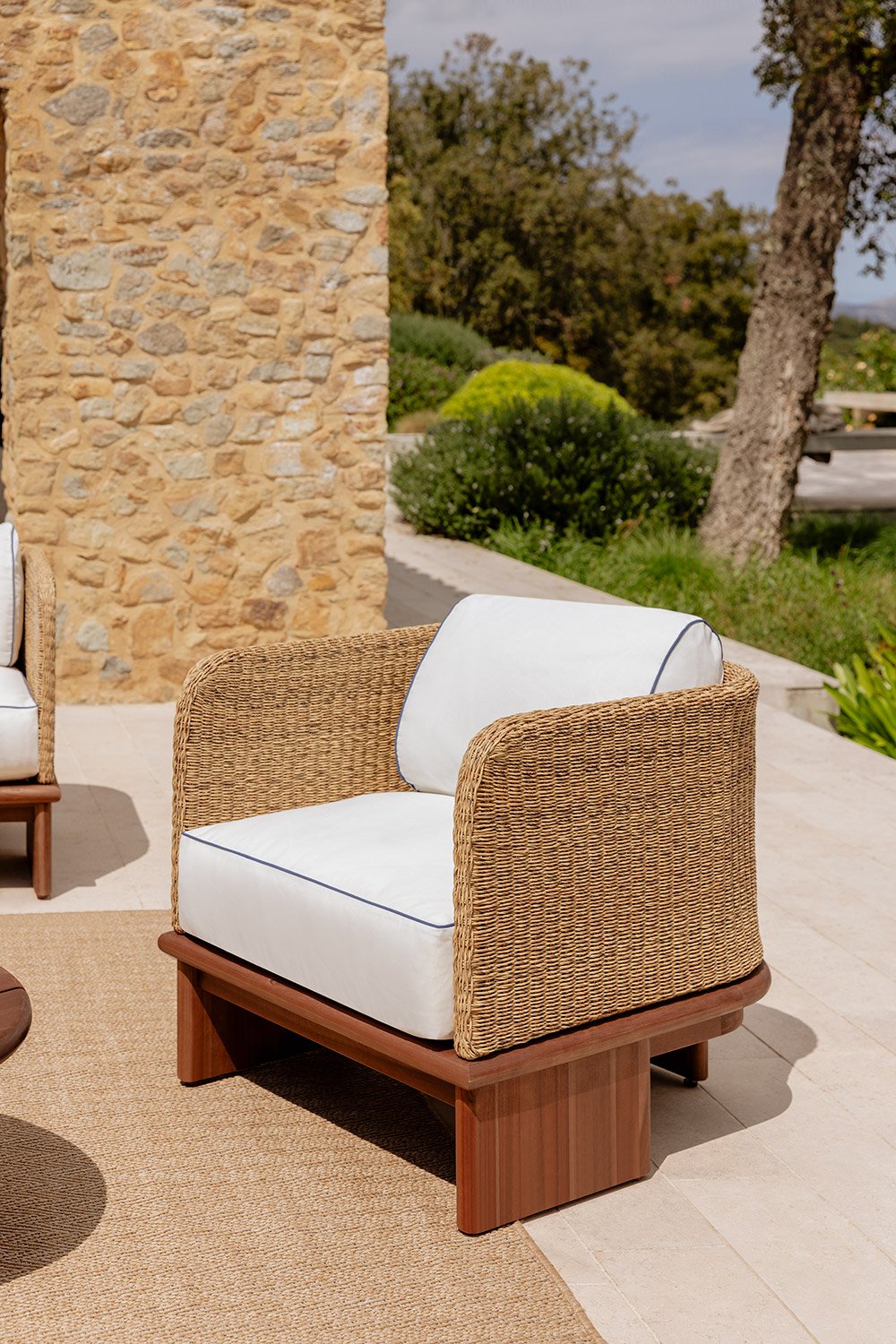 Famara rattan and acacia wood garden armchair, gallery image 1