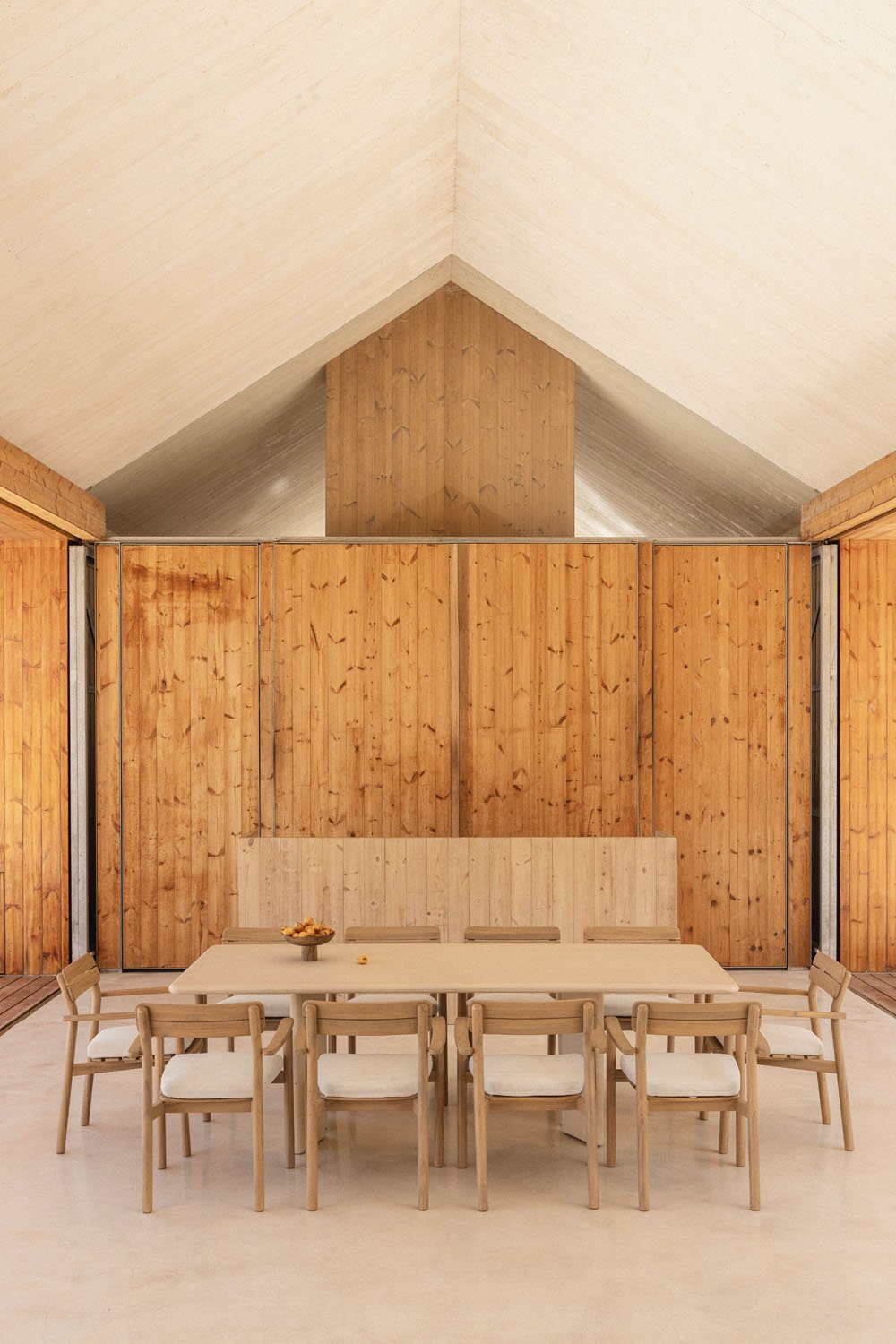 Rectangular table set 240x100 cm in Chelsea cement and 10 Saira acacia wood garden chairs with armrests, gallery image 1
