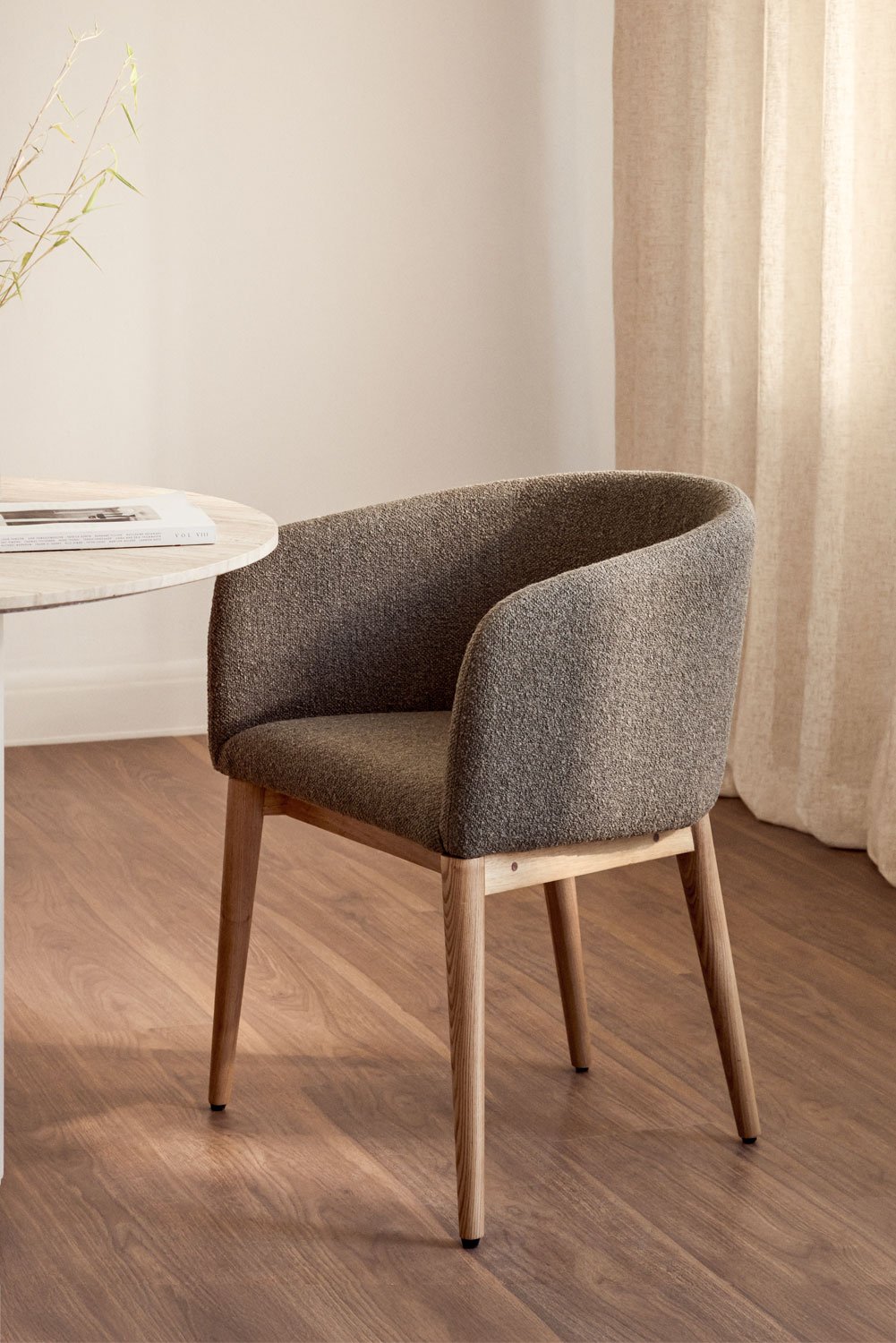 Bunia upholstered dining chair with armrests, gallery image 1