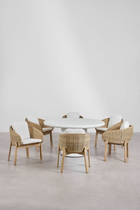 Namara cement round table set, 140 cm diameter, and 6 Leilan acacia wood dining chairs.