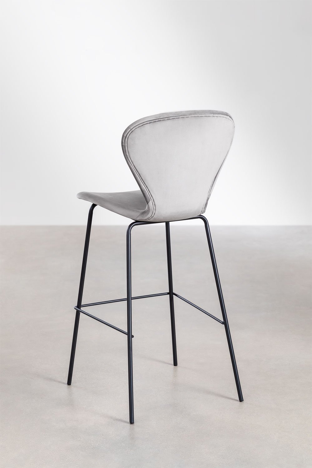 On a high stool., gallery image 3