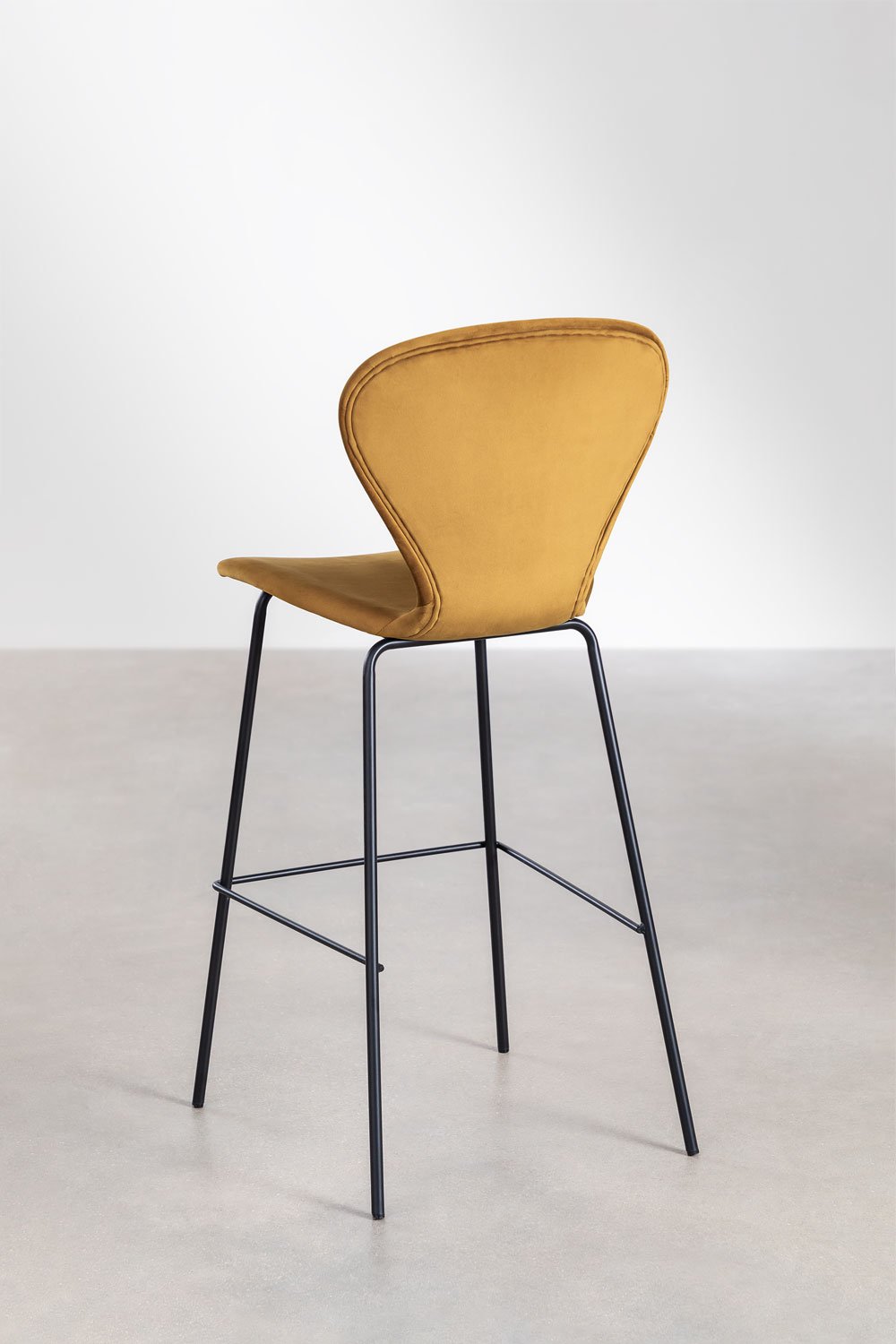 On a high stool., gallery image 3