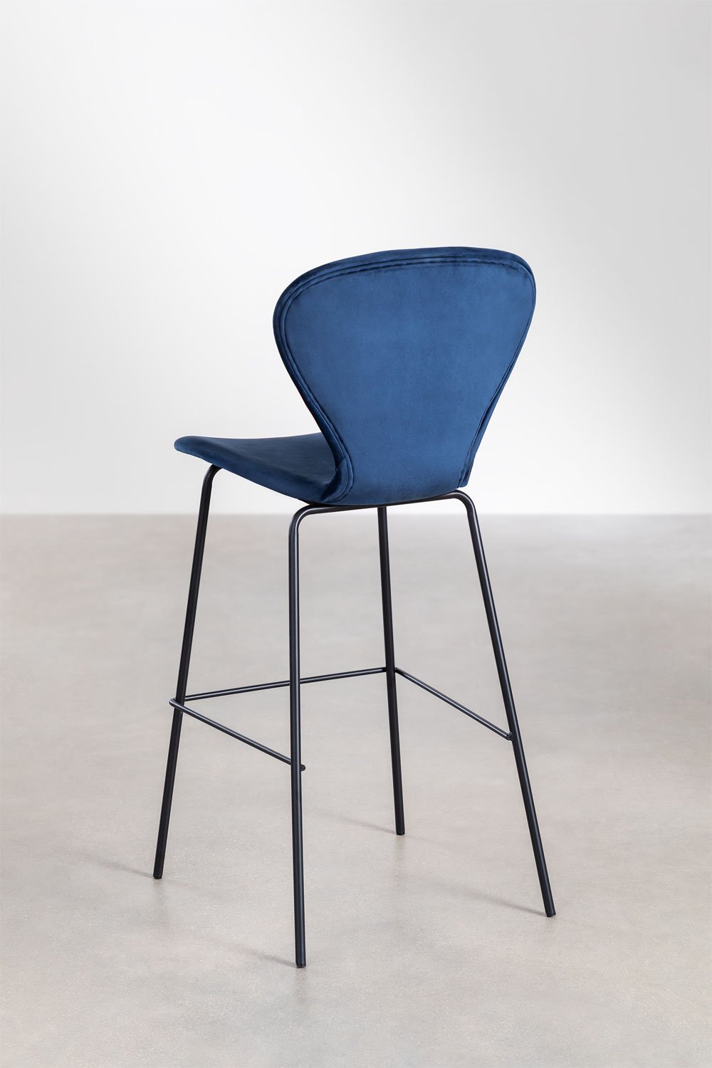 On a high stool., gallery image 3