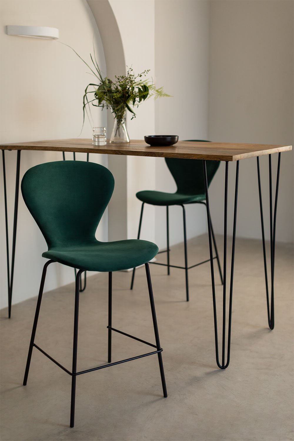 On a high stool., gallery image 1