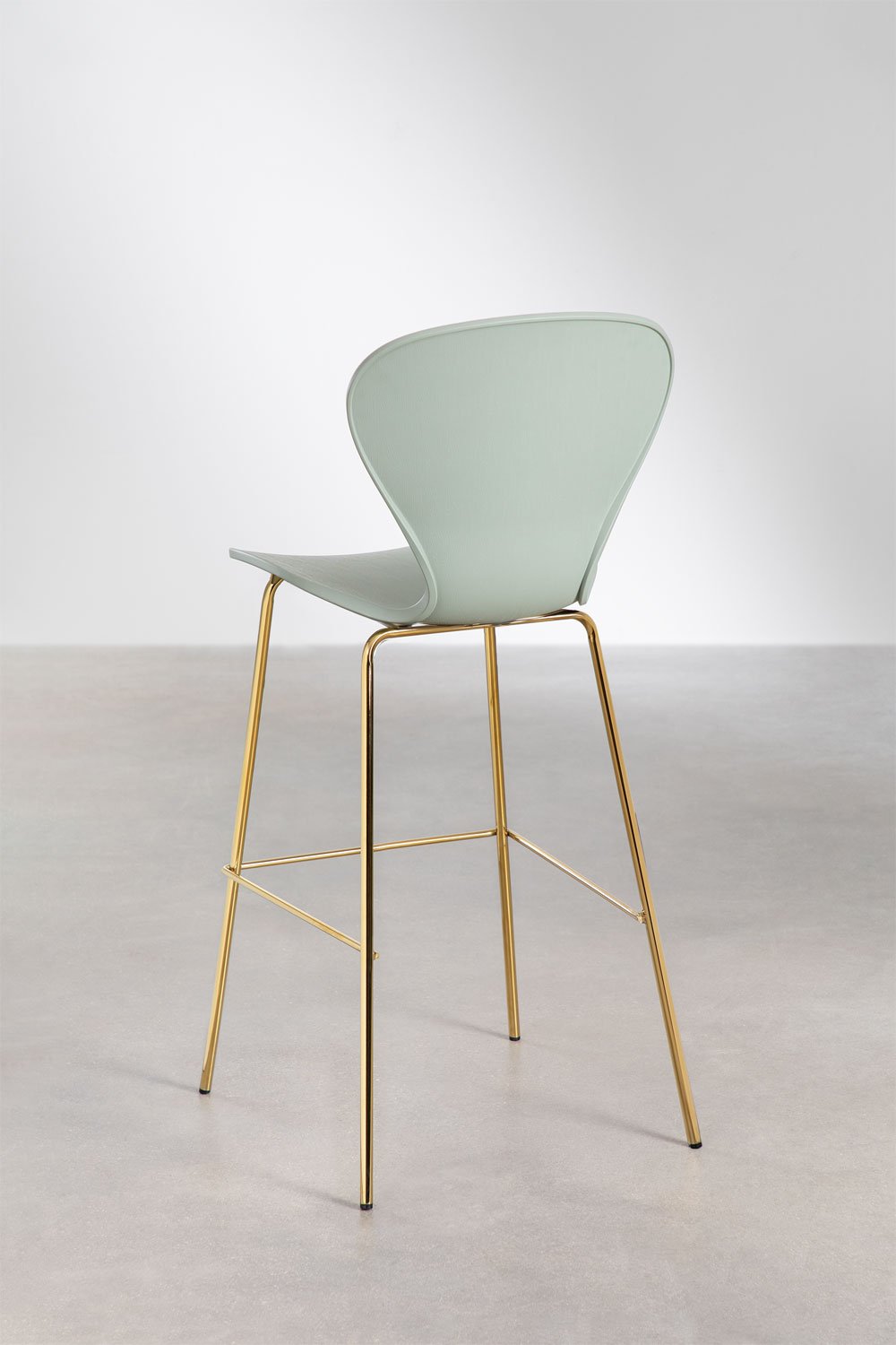 On a high stool., gallery image 3