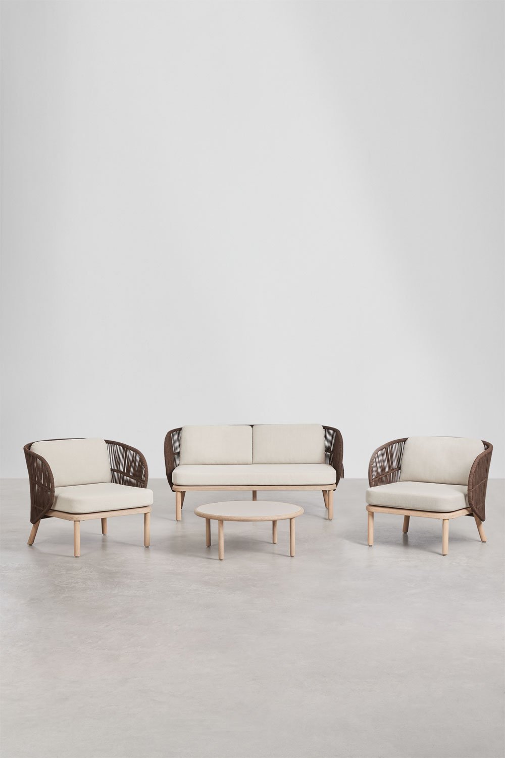 Garden set with 2-seater sofa, 2 Capri braided rope armchairs, and Olivia acacia wood coffee table, gallery image 1