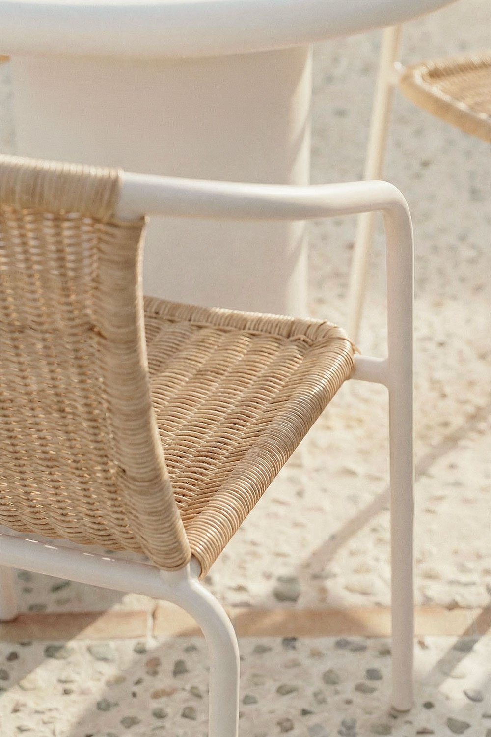 Stackable garden chair with armrests in steel and synthetic rattan Kalymana, gallery image 2