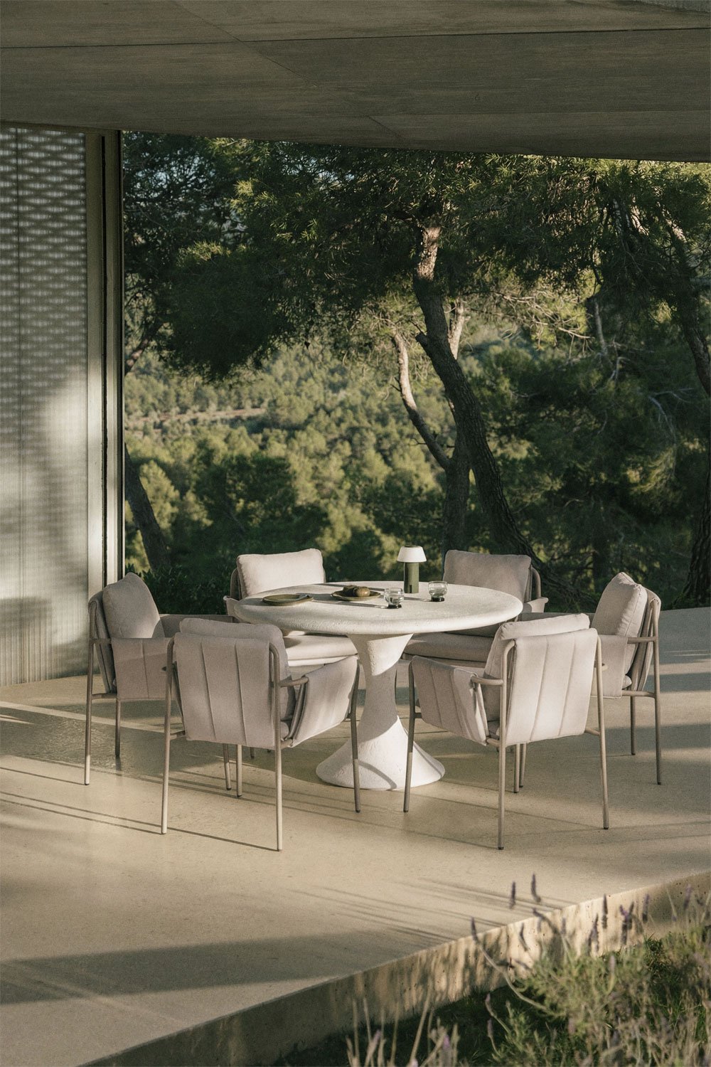 Eloria Ø120 cm round cement table set and 6 garden armchairs upholstered and in Zunika steel, gallery image 1