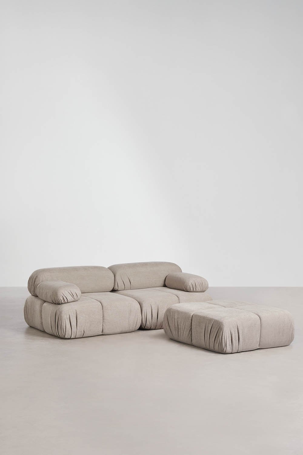 Kendall 2-piece modular sofa and bouclé vacuum-packed pouf, gallery image 1