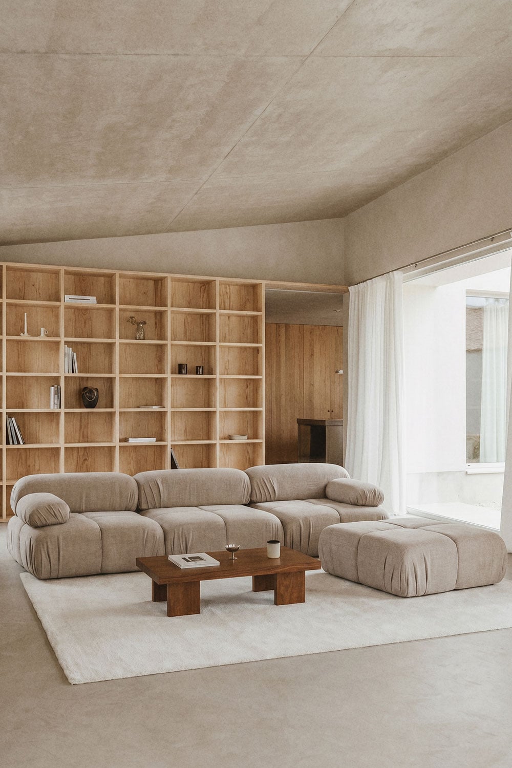 Kendall 3-piece modular sofa and bouclé vacuum-packed pouf, gallery image 1