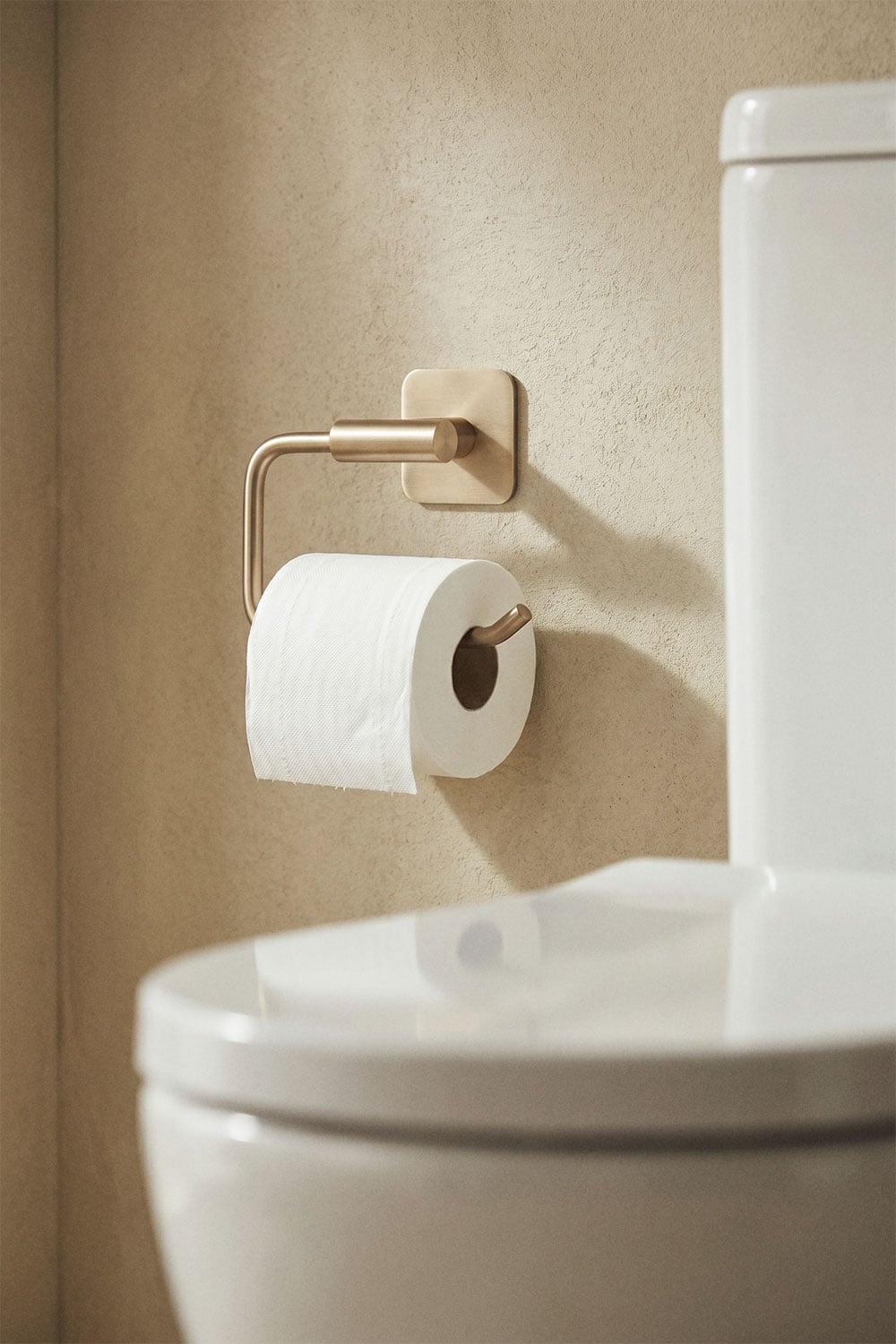 Adhesive toilet paper holder for bathroom in brushed gold stainless steel Ondreli, gallery image 1
