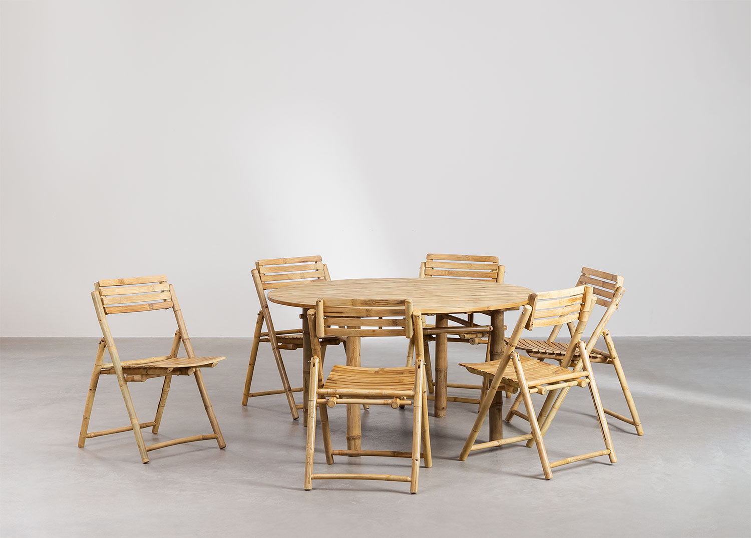 Set tavolo rotondo Senia (Ø140 cm) e 6 sedie da giardino pieghevoli in  bambù Nelida - SKLUM