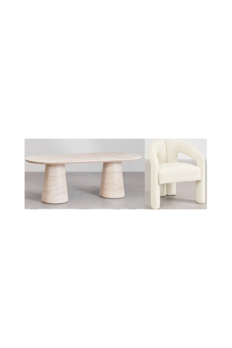 Set tavolo ovale Noemi 220x95 cm in cemento effetto travertino e 8 sedie da pranzo Greca in tessuto bouclé.
