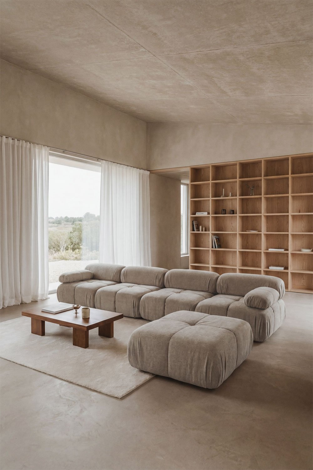 Divano modulare a 4 pezzi e pouf in bouclé confezionato sottovuoto Kendall, immagine della galleria 1