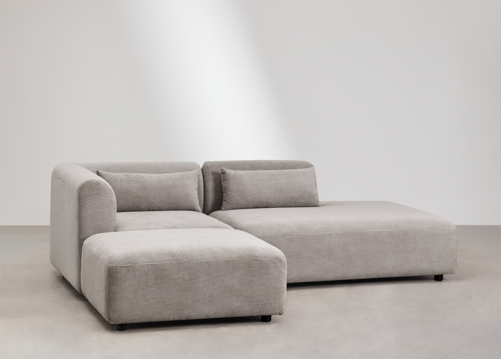 2-delige modulaire hoekbank met chaise longue rechts en Fogler poef