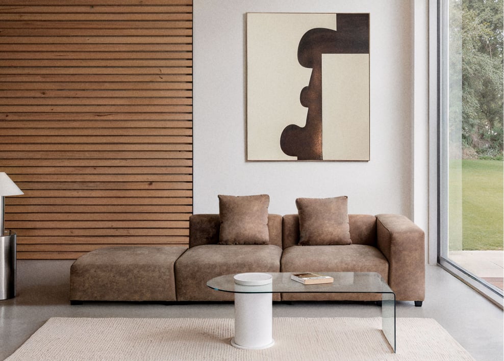 Modułowa sofa narożna prawostronna z 2 części z wysokim podłokietnikiem i pufą ↔︎285 cm Bruna