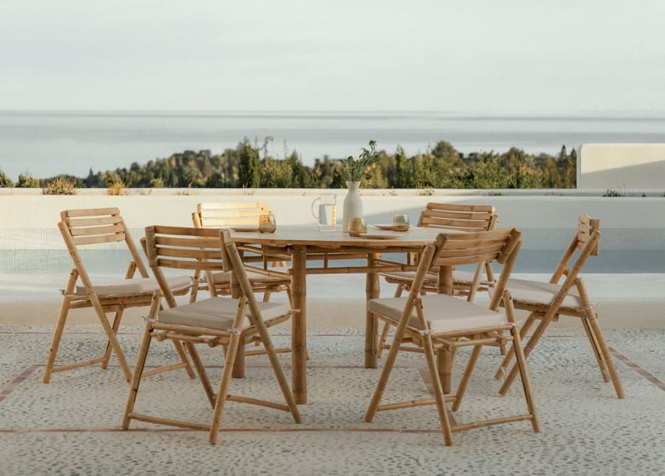 Zestaw okrągłego stołu Senia (ø140 cm) i 6 składanych bambusowych krzeseł ogrodowych Nelida