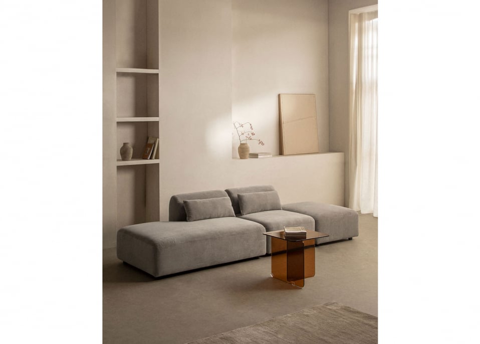 Dwuczęściowa sofa modułowa z lewym szezlongiem i pufą Fogler