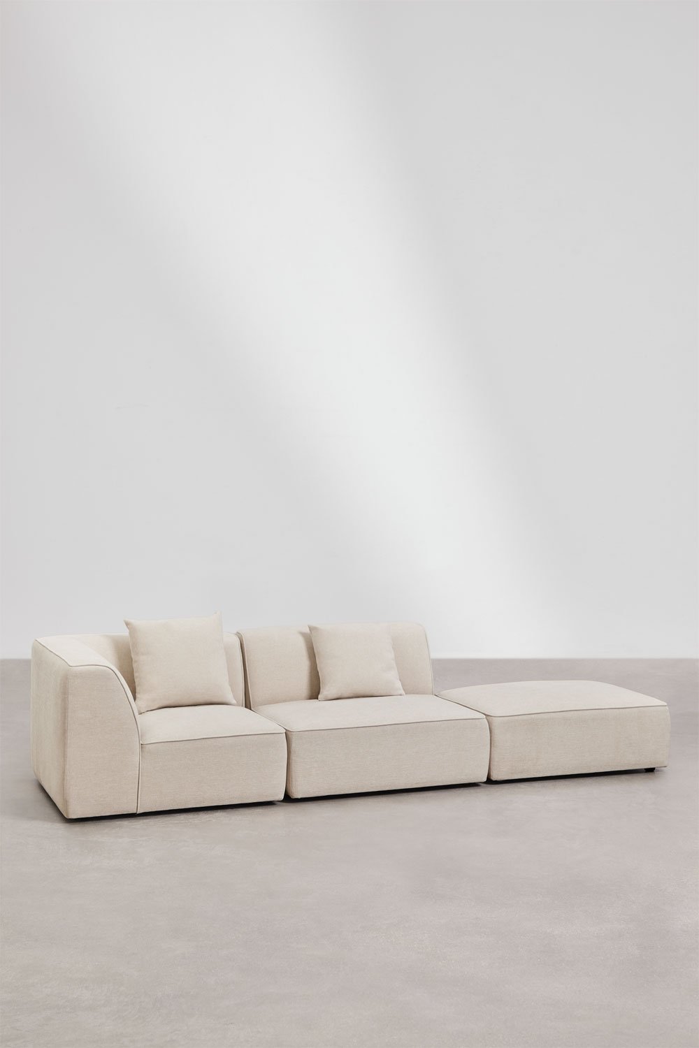 Narożna sofa modułowa Cardea 2-częściowa z tapicerowanym pufem, obrazek w galerii 1