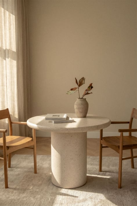 Mesa de jantar redonda em cimento Emiria