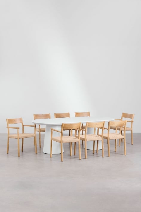 Set of oval cement table (220x95 cm) Noemi and 8 dining chairs in oak wood and braided rope Mara