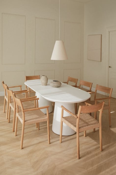 Set of oval cement table (220x95 cm) Noemi and 8 dining chairs in oak wood and braided rope Mara