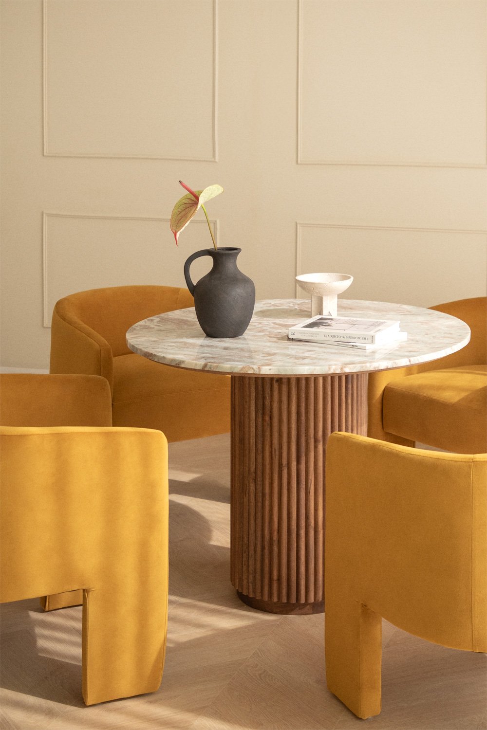 Round dining table in natural stone and mango wood Giselda, gallery image 1