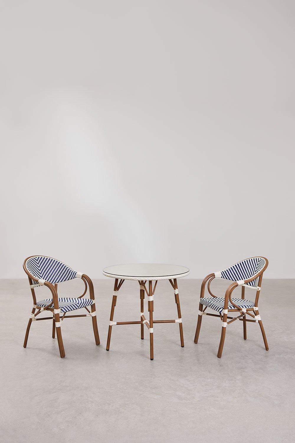 Brielle Bistro round table set, Ø80 cm, and two stackable dining chairs with armrests in aluminium., gallery image 1