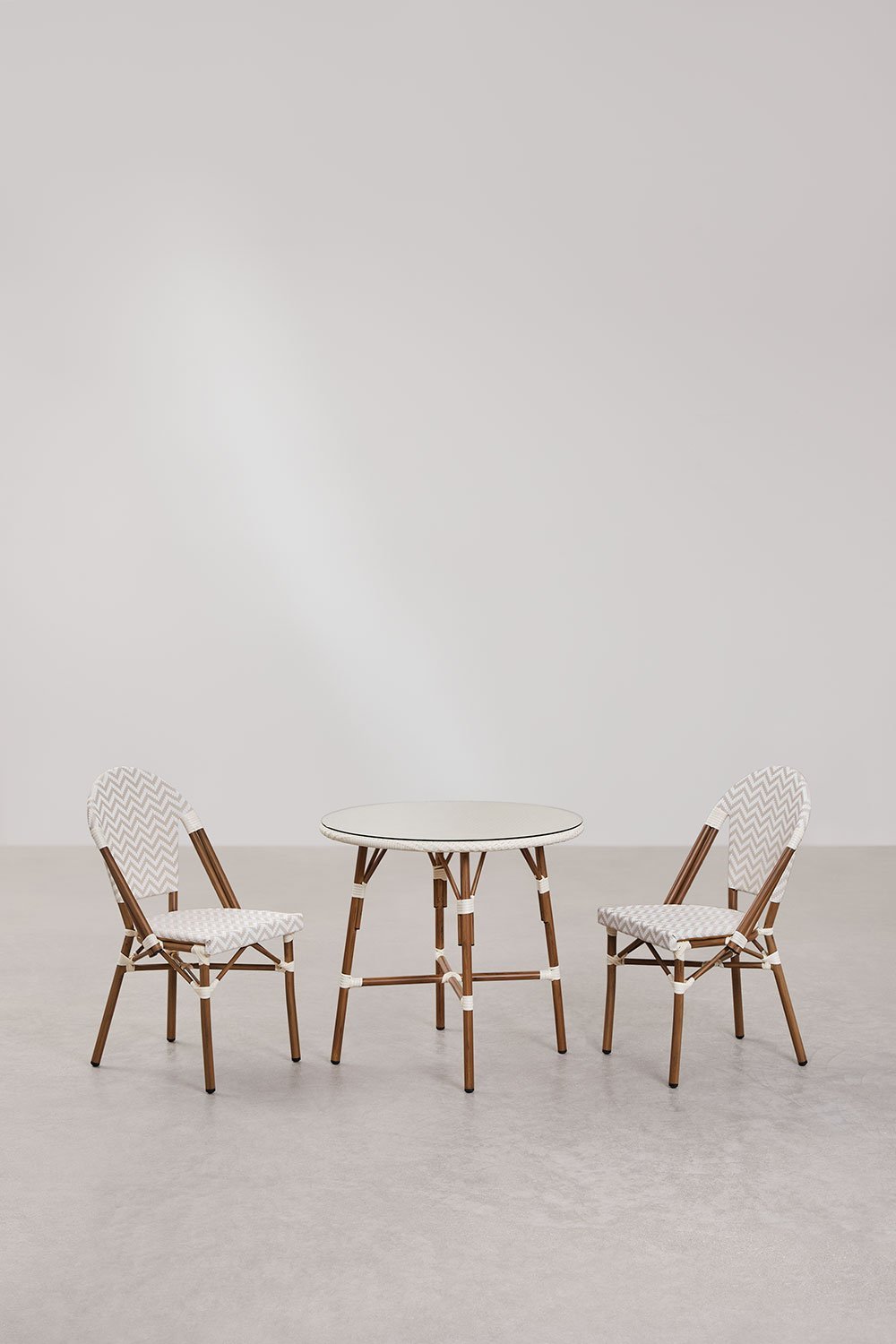 Round table set Ø80 cm and 2 stackable dining chairs in aluminum and synthetic rattan Brielle Bistro, gallery image 1