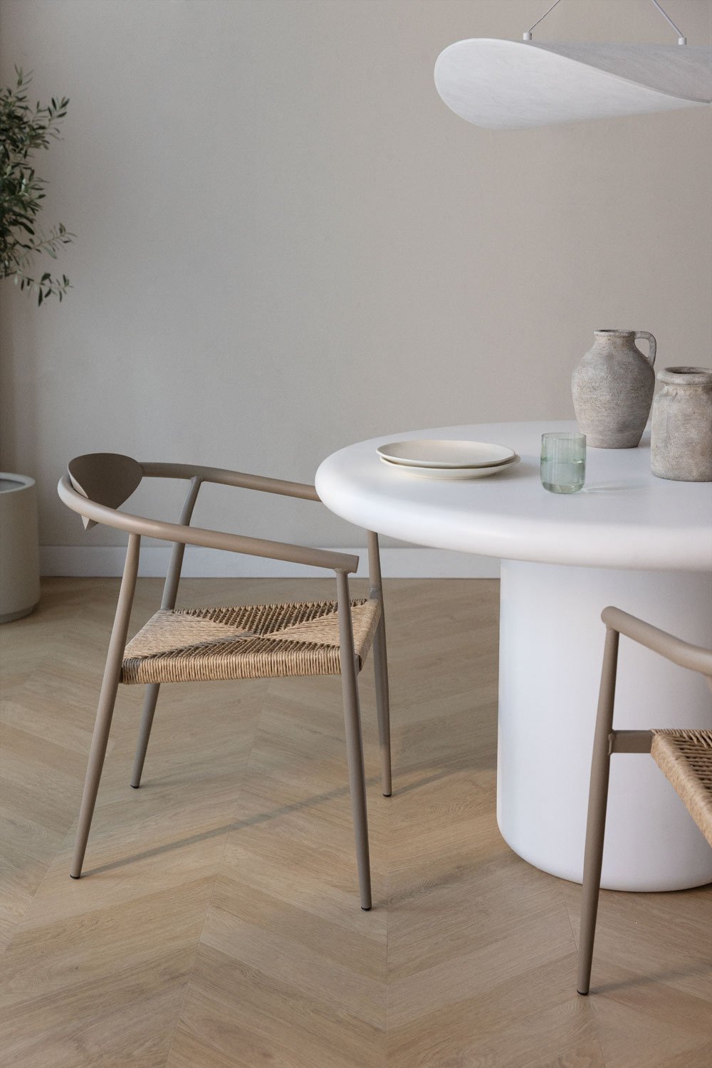 Stackable dining chair with armrests in aluminum and synthetic rattan Marsha, gallery image 1